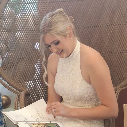 Newlyweds with their wedding cookbook gift